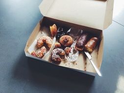 Box of sweet doughnuts