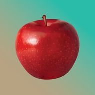 red apple on a two-color background