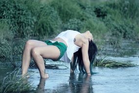 model posing in the wild pond