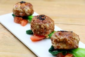three fried chicken cutlets