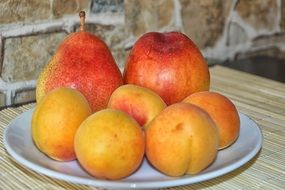 Fruit Plate with pear and apricots closeup