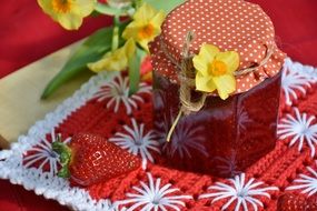 strawberry jam in a glass jar