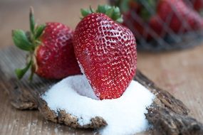 red strawberry in sugar