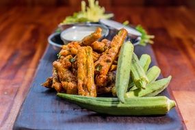 Indian dinner on a brown wooden table