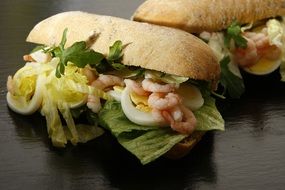 Tasty breakfast Sandwich Eggs Prawns Salad