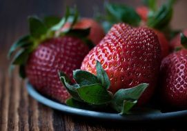 strawberries red fruit desert on plate