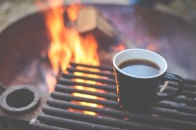 Coffee cup Heating Up on Grill