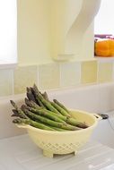 green asparagus in a bowl