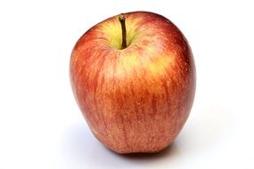 spotted red apple on the table