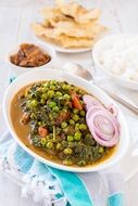 bean with beef on a white plate