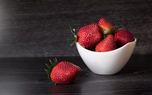 Red delicious Strawberries in white cup