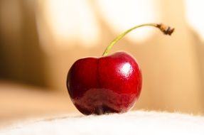 red cherry on a blurred background