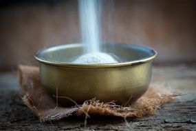 brass bowl with semolina