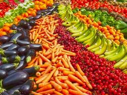 Greengrocers, colorful fruits and vegetables on market stall