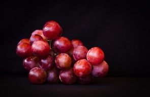 delicious Grapes on dark background