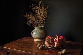 dried flowers and fruits on Suitcase