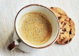 cup with coffee on coffee break