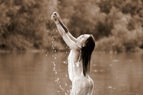 woman splashing around in the water