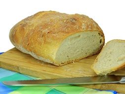fresh wheat bread on the cutting board