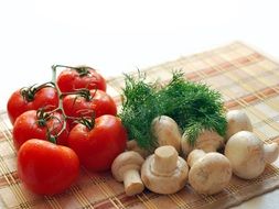 red tomatoes, champignons and dill