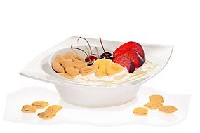 Breakfast of fruit yogurt and cookies