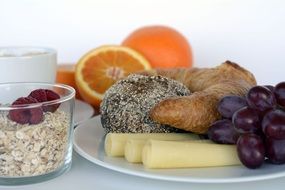 healhty Breakfast with cheese, fruits and berries