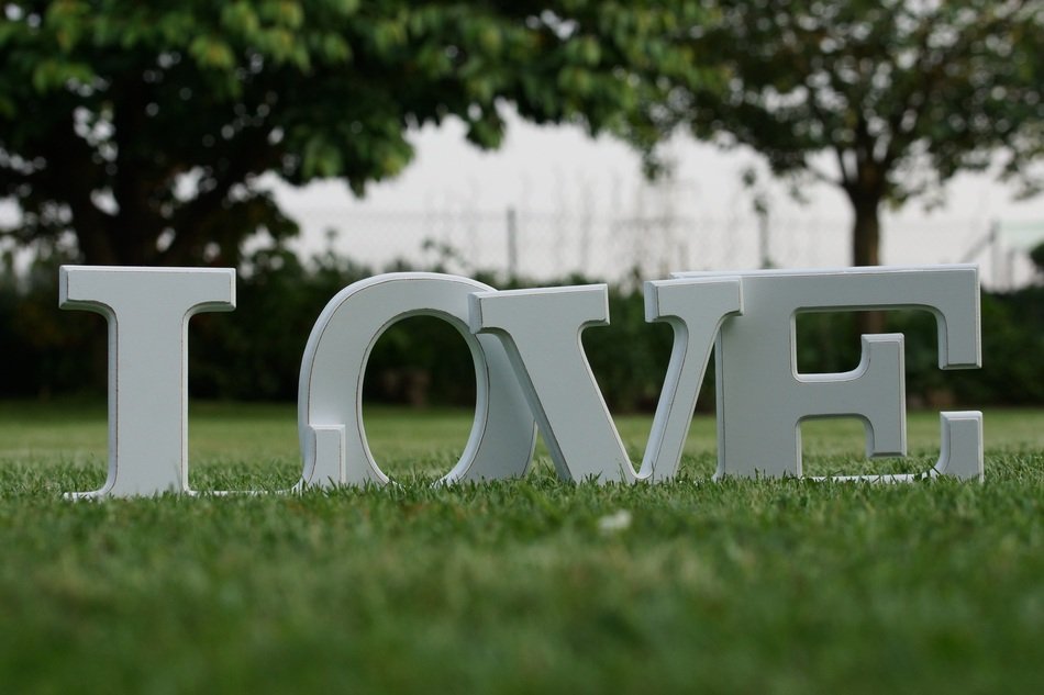 Love, white Letters on Grass