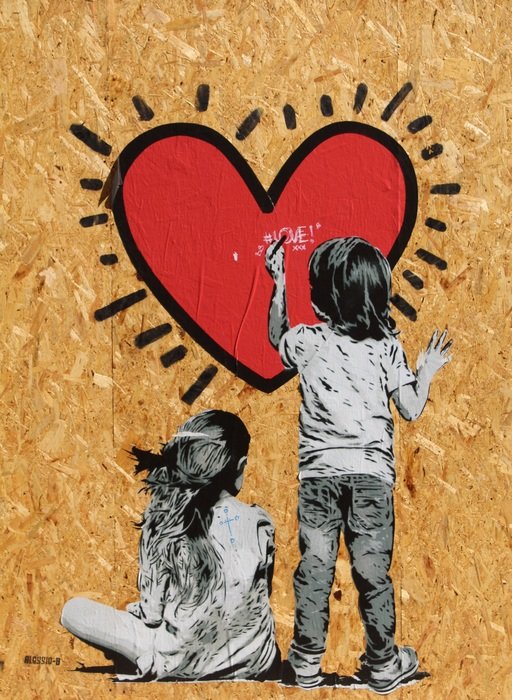 portrait of children painting on the wall