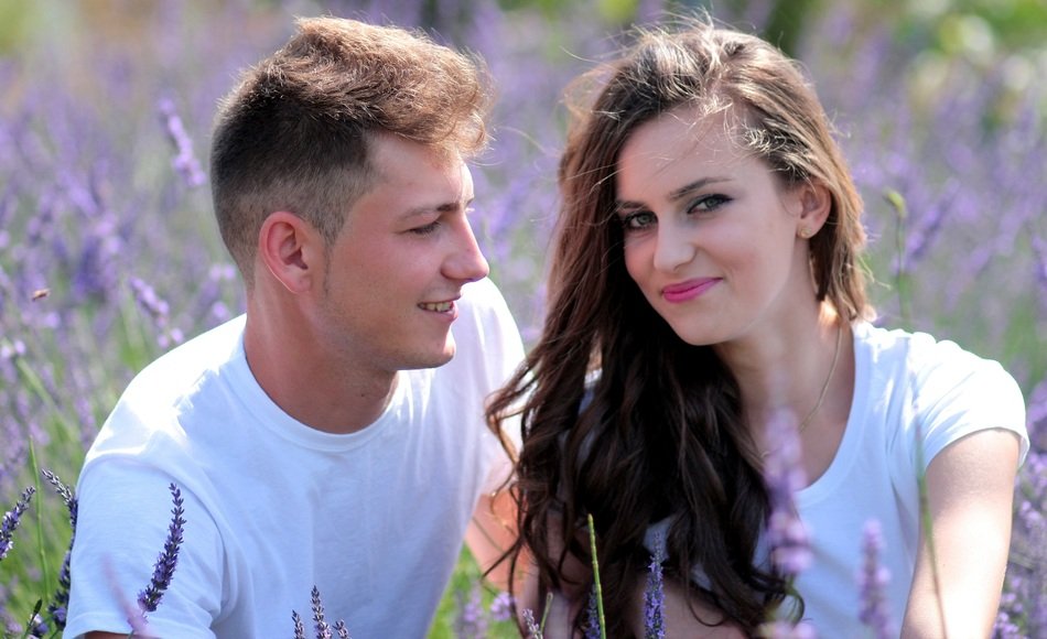 happy couple of lovers in lavender field