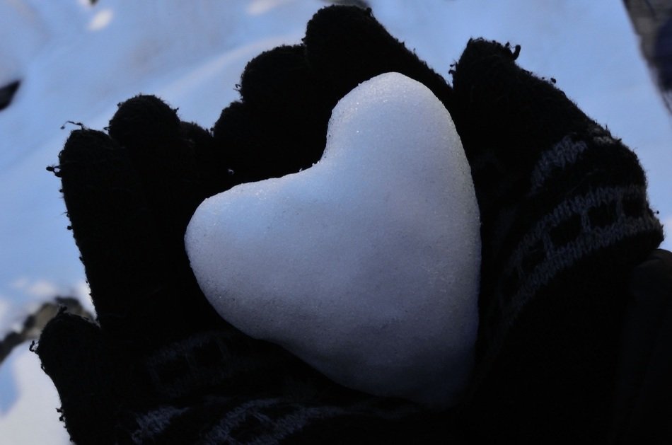 heart of snow in palms