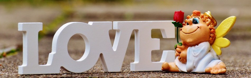 word 'love' with an angel