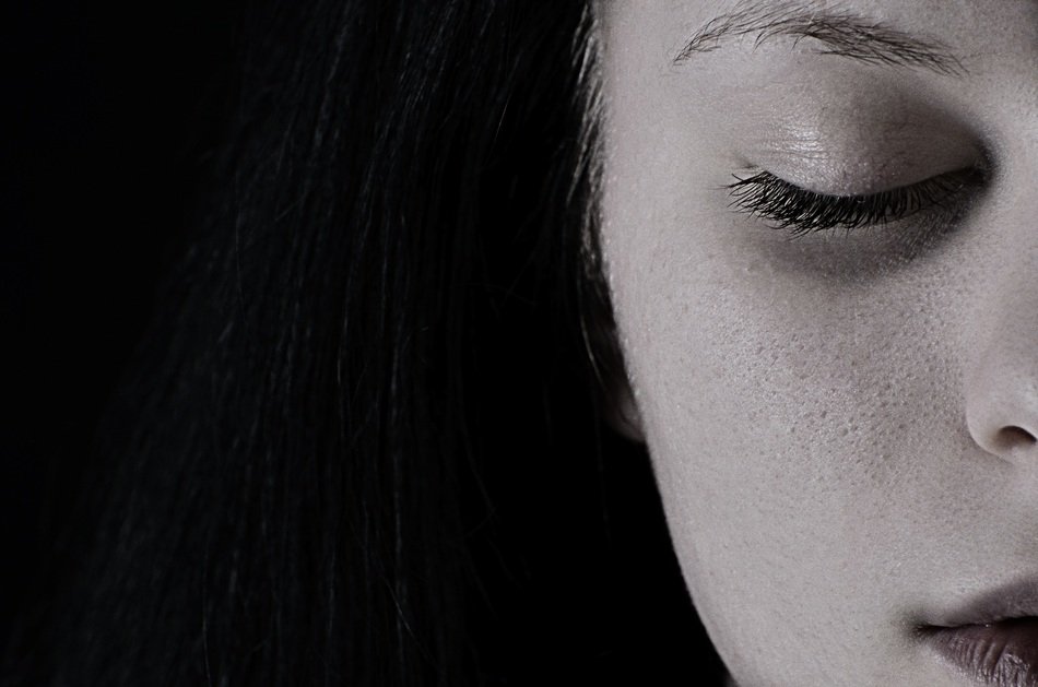 part of Girlâs face with closed eye