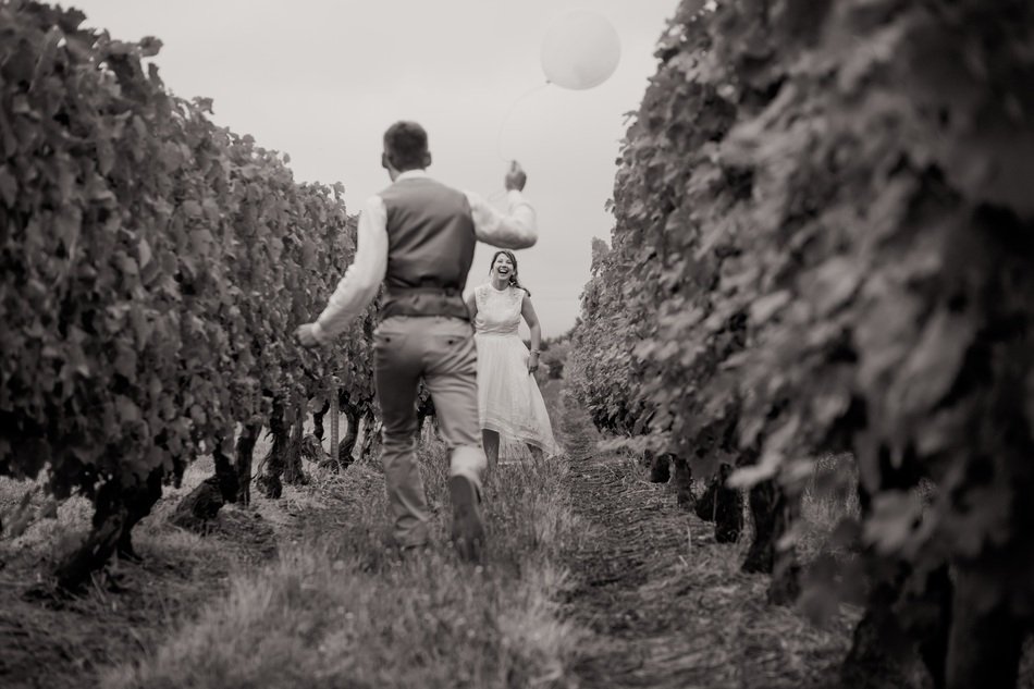 couple in love among in the vineyard in black and white image
