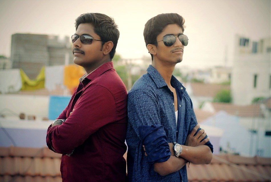 photo of two friends in sunglasses in India