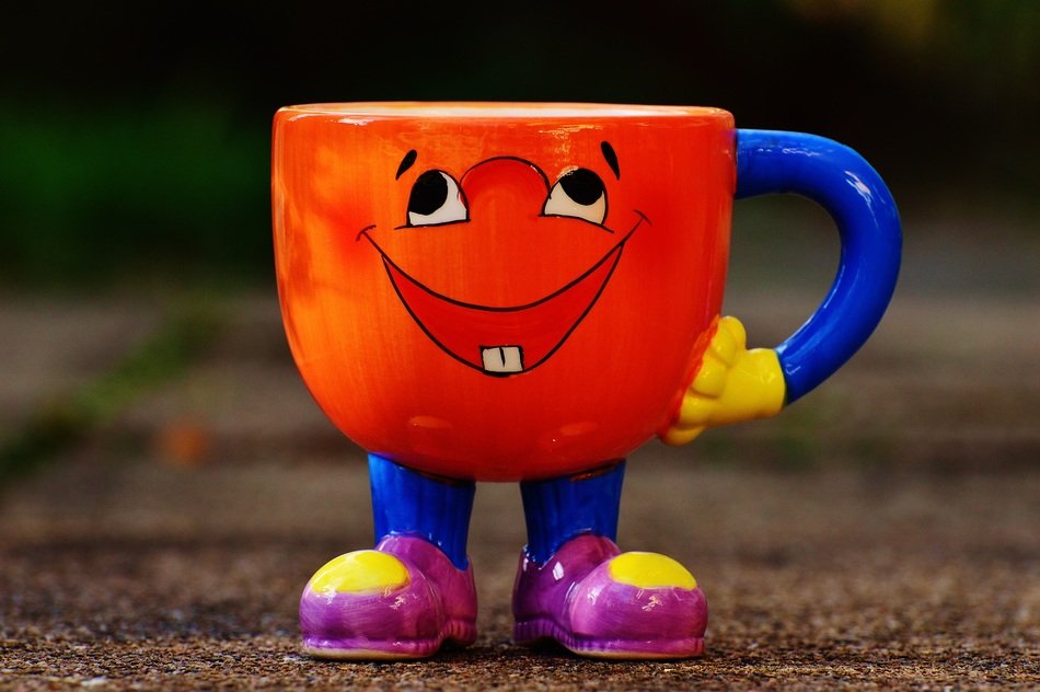 ceramic cup with arms and legs