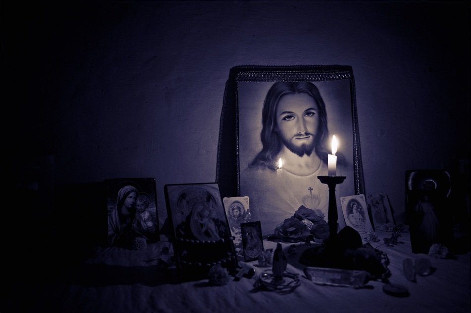 altar with Jesus and candle