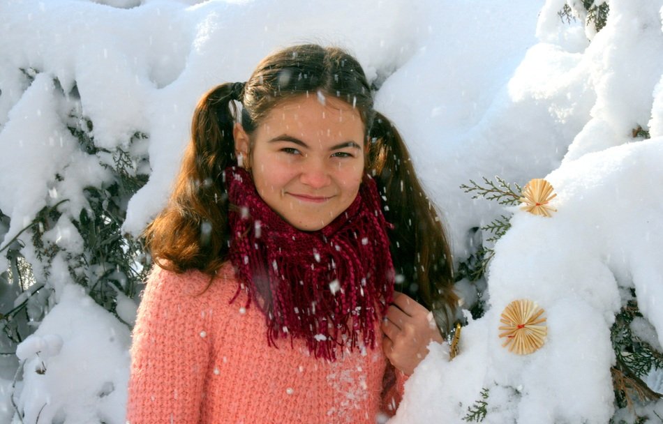 picture of the Girl is near the snowy trees