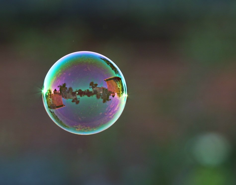 reflection in a sphere of a picturesque landscape