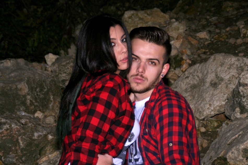 lovers near stones at night