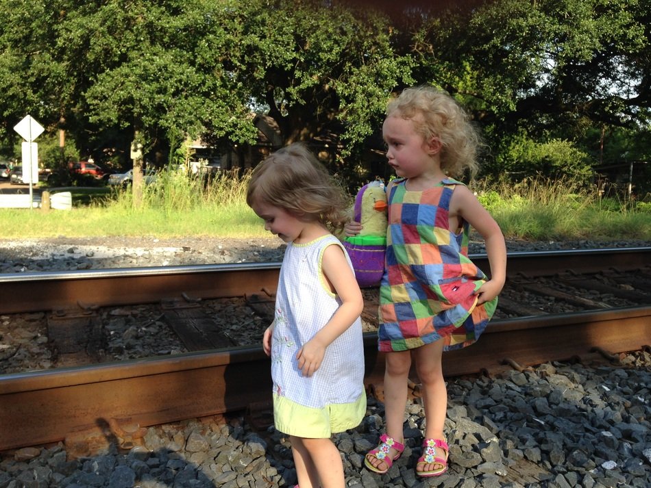 two girls at the rail