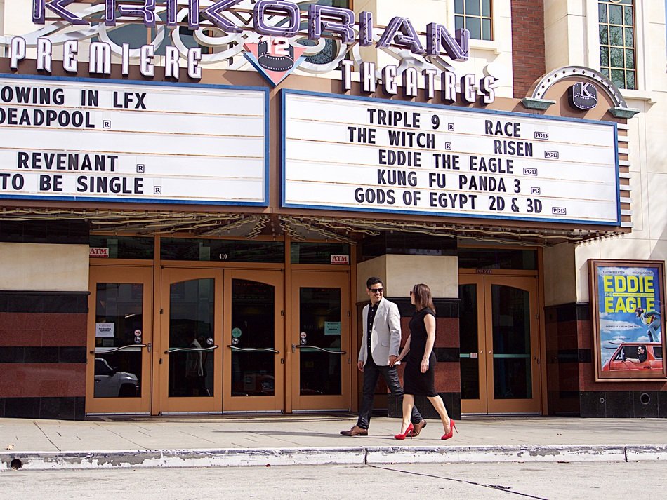 romantic couple walking on the street