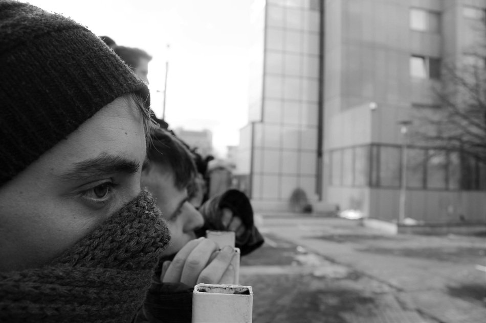 black and white photo of vandals in the street