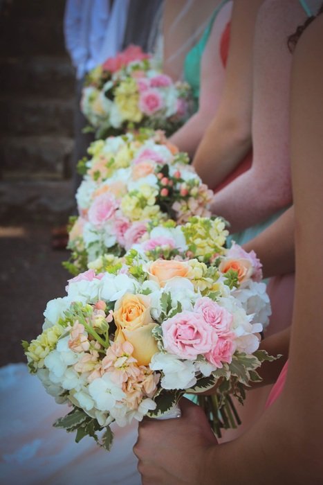 bouquets in the hands of bridesmaids