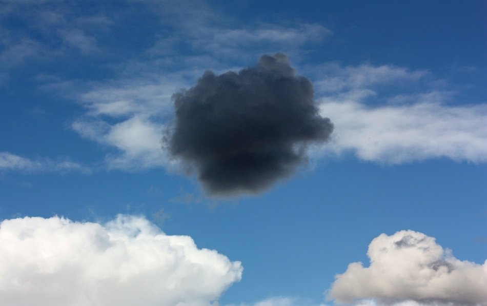 black cloud among white clouds