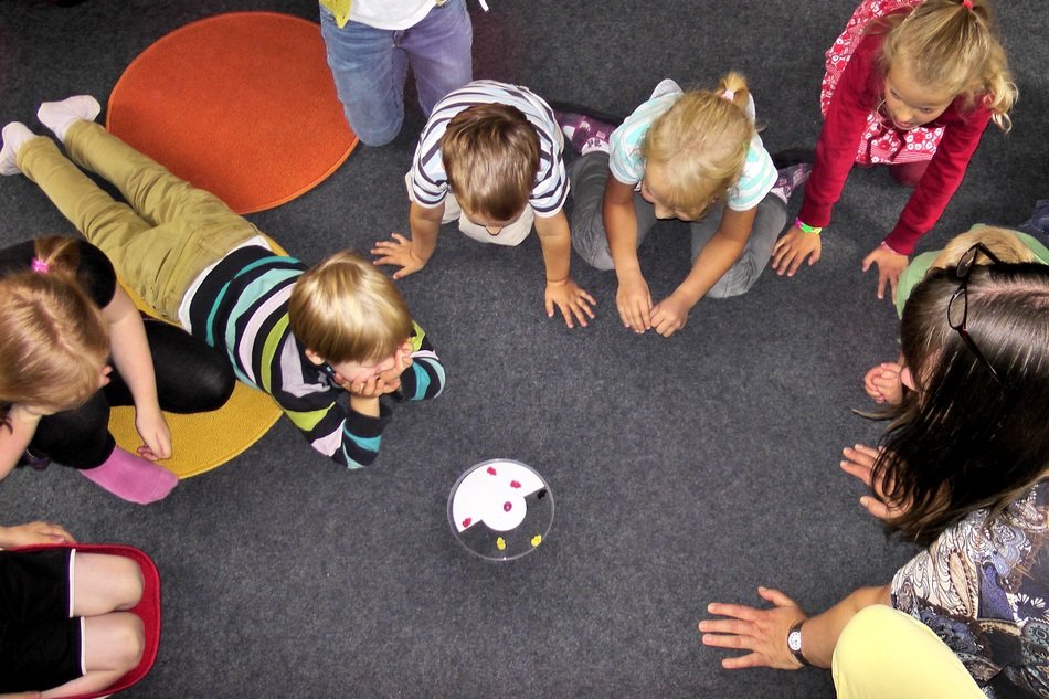 group of Children and woman Playing on floor