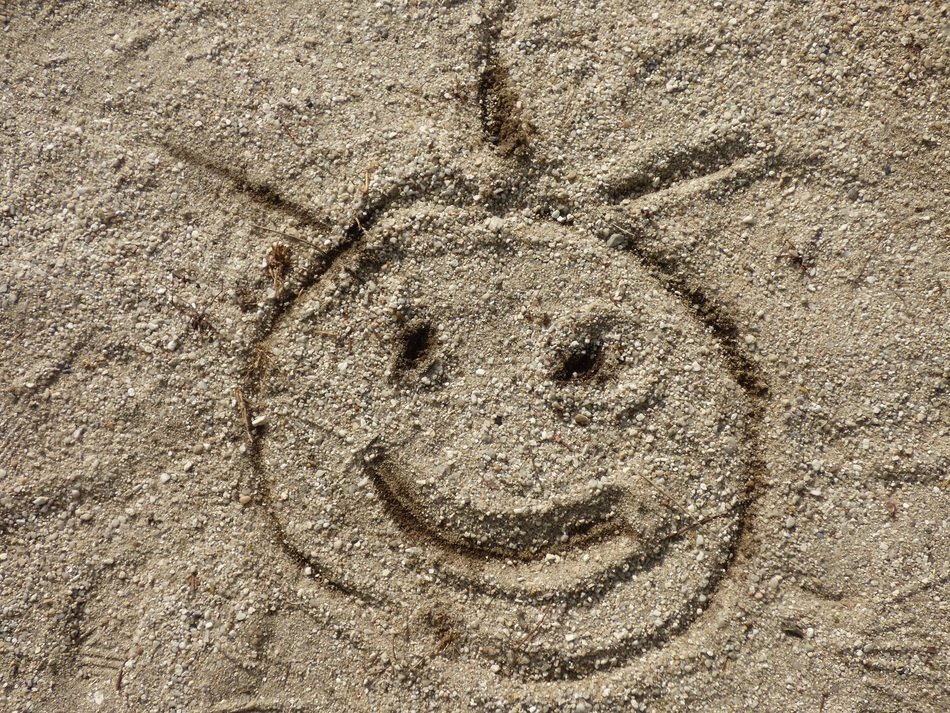 funny face in the sand in the sun