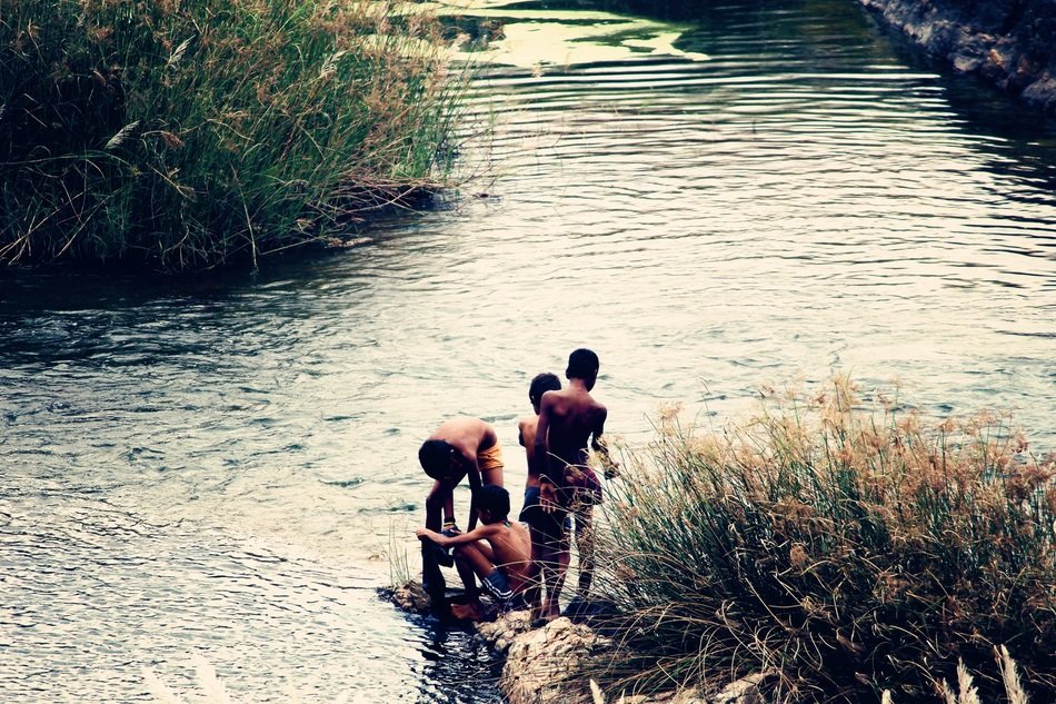 Kids in the river in summer