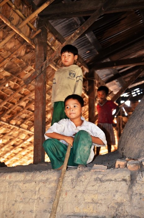 children play in the attic of a building