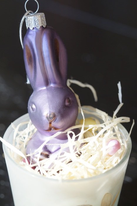 easter decoration in the straw in a glass closeup