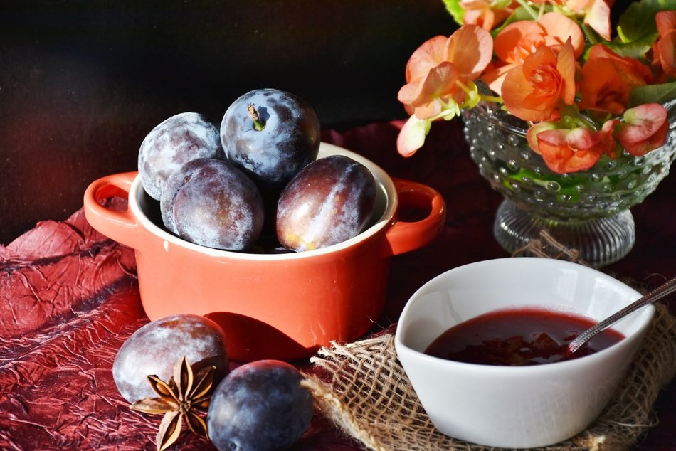 Plums and jam in the bowls